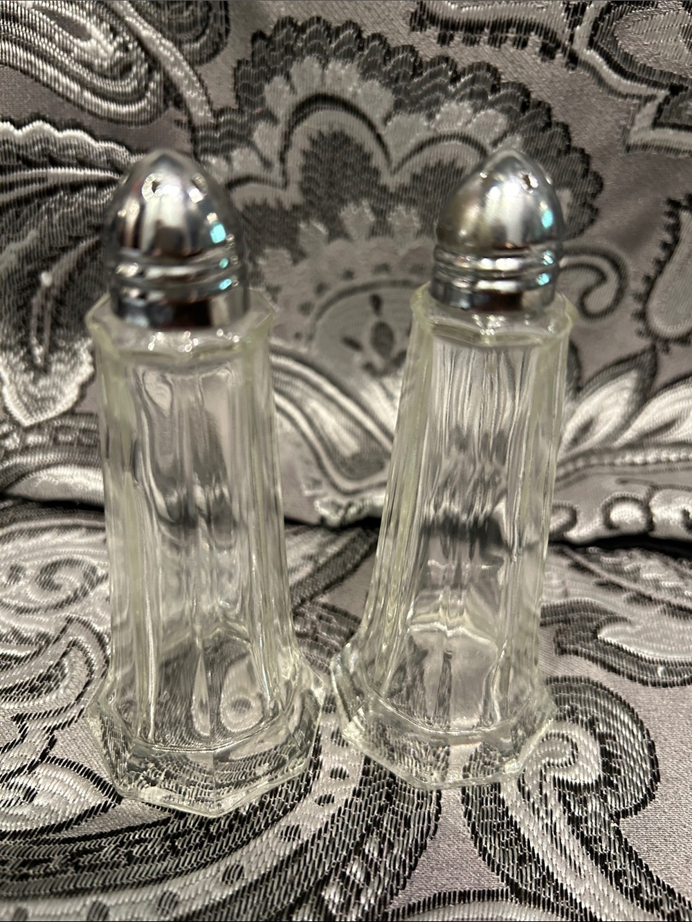 Clear Glass Salt and Pepper Shakers with Silver Tops
